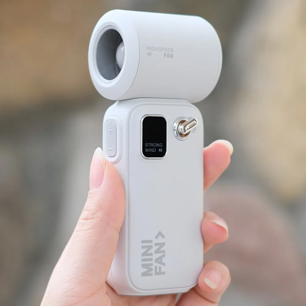 

Новинка 2025 года, 3600 мАч, мини-ручной электрический вентилятор, цифровой дисплей, высокоскоростной маленький ветровой пушка, портативный ручной вентилятор Storm Turbofan