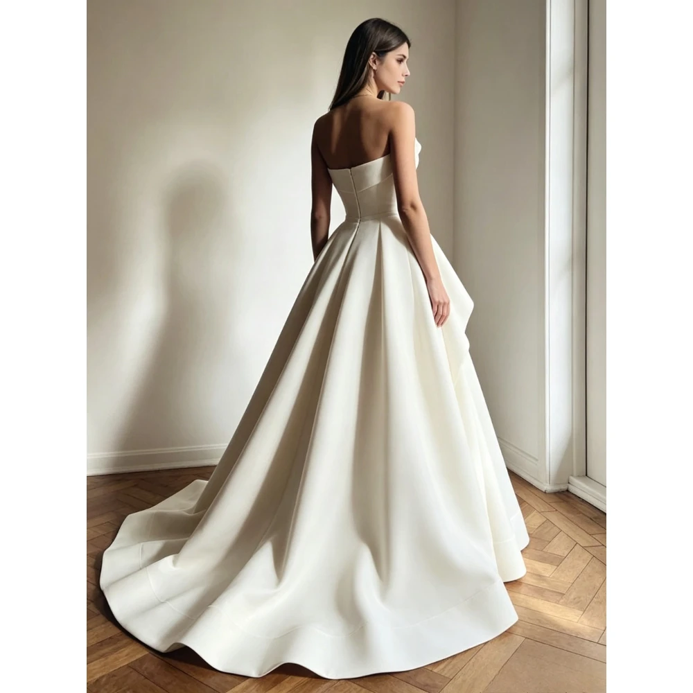 Customized Simple Strapless A-line Strapless Wedding Dresses 2026 Sleeveless Large Swing Satin Bridal Gown Irregular Folding