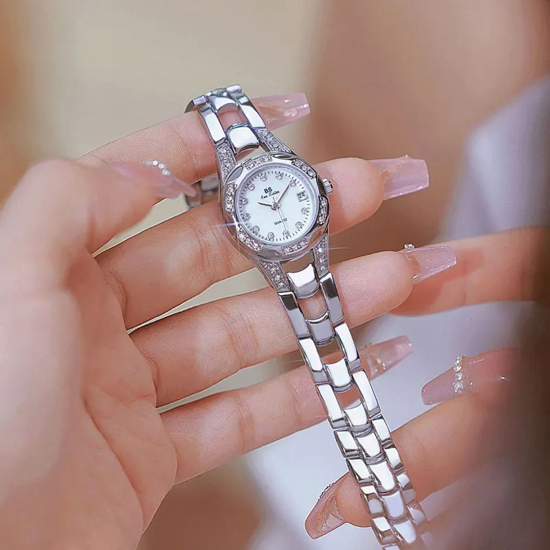 Korean Hollow Silver Bracelet Women's Watch Quartz Pointer Calendar Steel Strip Women's Watch Suitable for New Year Gift Box