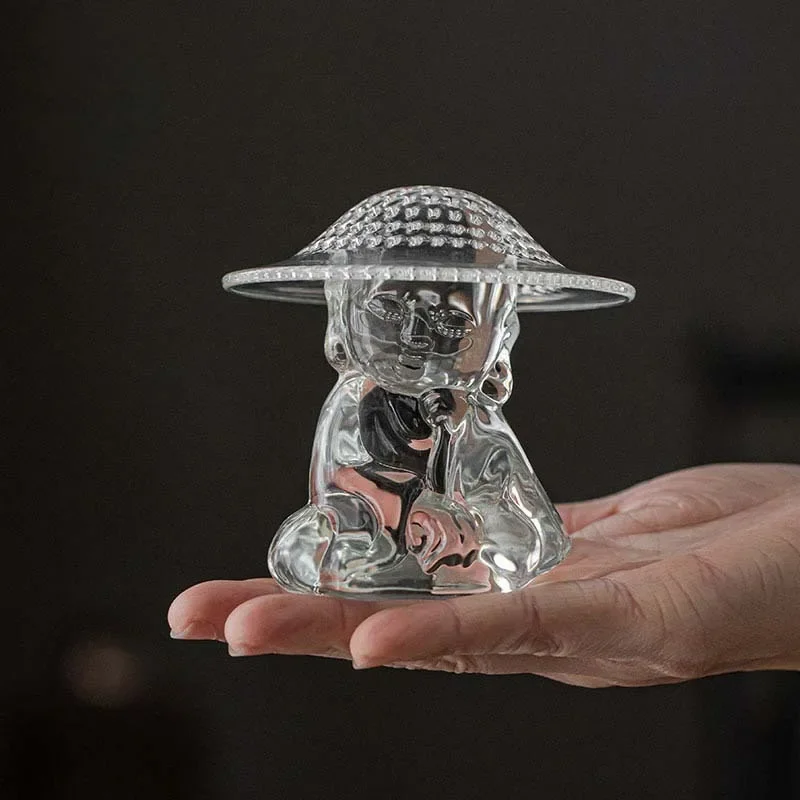 

Glass little monk leak creative tea ceremony ornament tea separation leak tea pet