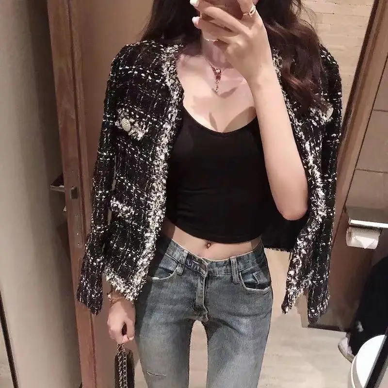 Spring and Autumn French style long sleeved shirt for women 2026 new round neck retro tassel women's coat
