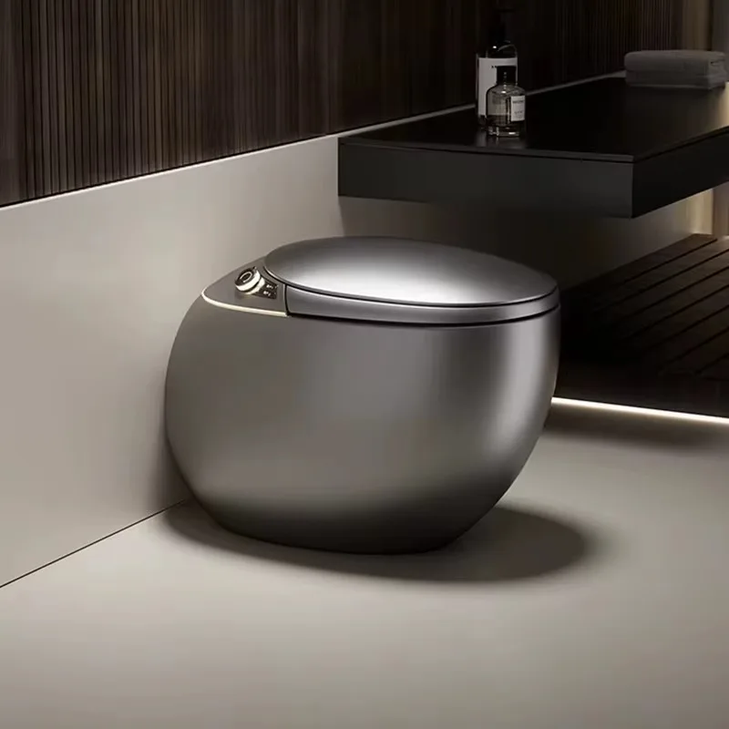 

Высококачественный оранжево-серый электрический унитаз с функцией самоочистки, интегрированным подогревом сиденья, S-образным сливом и дистанционным управлением.