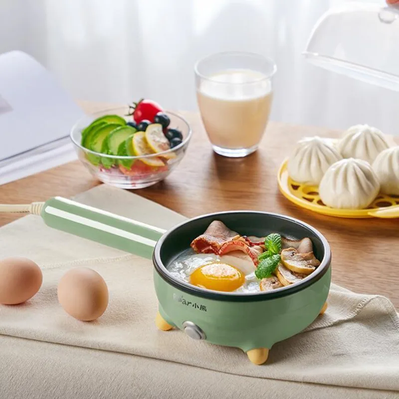 หม้อต้มไข่แบบเสียบปลั๊กขนาดเล็กสำหรับใช้ในครัวเรือนเครื่องต้มไข่อัตโนมัติเครื่องใช้ไฟฟ้าในครัว