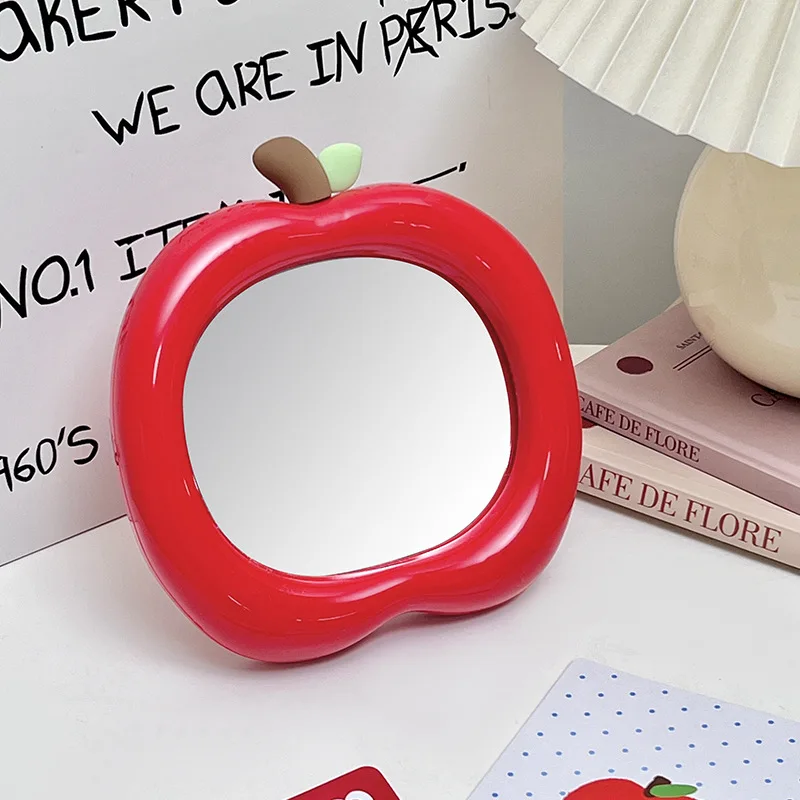 กระจกโต๊ะเครื่องแป้งรูปทรงผลไม้ขาตั้งขนาดกะทัดรัดแบบพกพาสำหรับศึกษาสำนักงานแต่งหน้าตัวเลือกที่ชัดเจนตกแต่งบ้าน