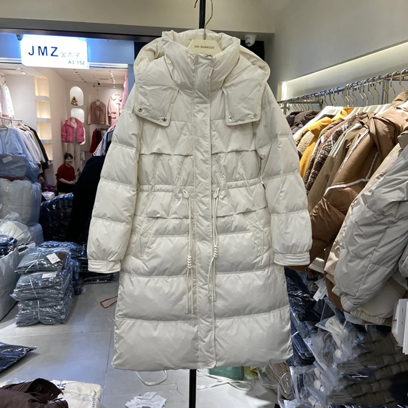 Piumino invernale lungo Parker con cappuccio Piumino femminile con coulisse in vita caldo al ginocchio Capispalla da donna Piumini spessi in piuma d'anatra bianca