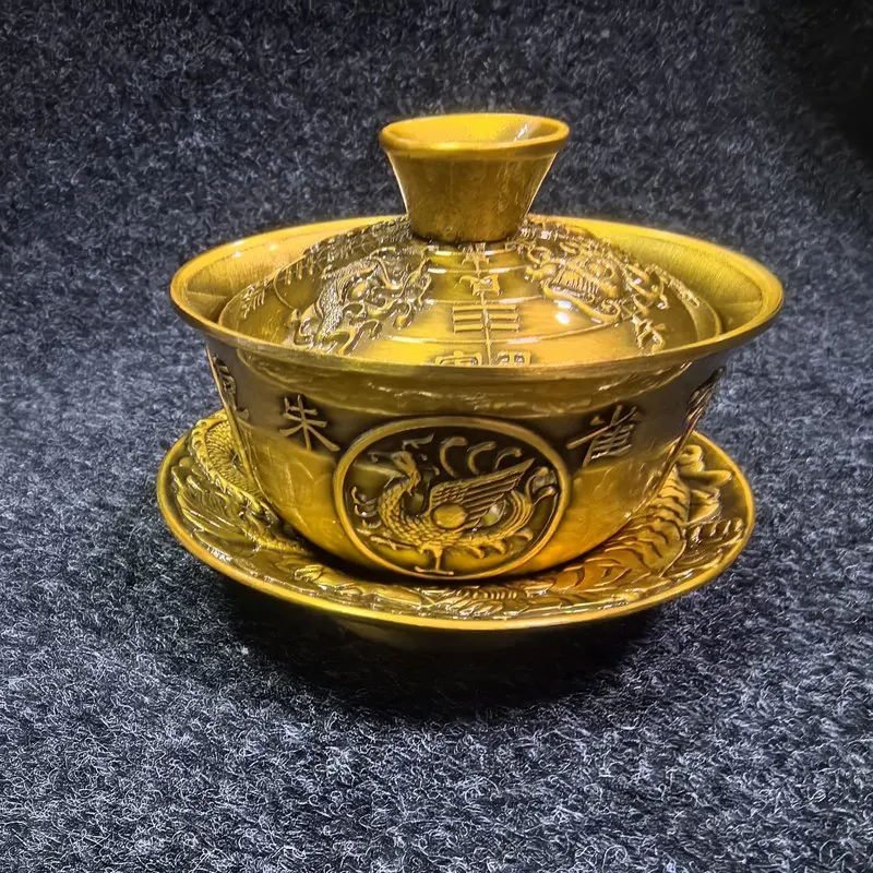 Antique-style copper relief with four auspicious animals, a three-tiered bowl, and a brass set for Kung Fu tea
