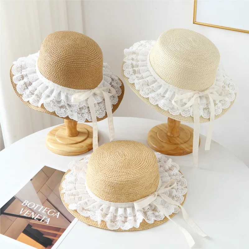 

A hollowed-out lace woven hat for women's outdoor vacation style with large brim and