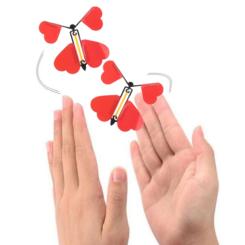 5/10/12 Uds. Juguete mágico de mariposa voladora, juguetes mágicos novedosos, banda de goma alimentada, trucos de magia de cuerda, juguetes, recuerdo de fiesta
