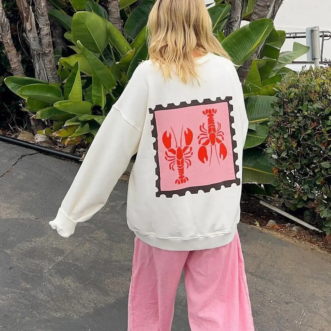 

A Niche American Trend Hoodie with High Street Prints, Lobster Stamps, and An Ins Style Women's Top for Commuting