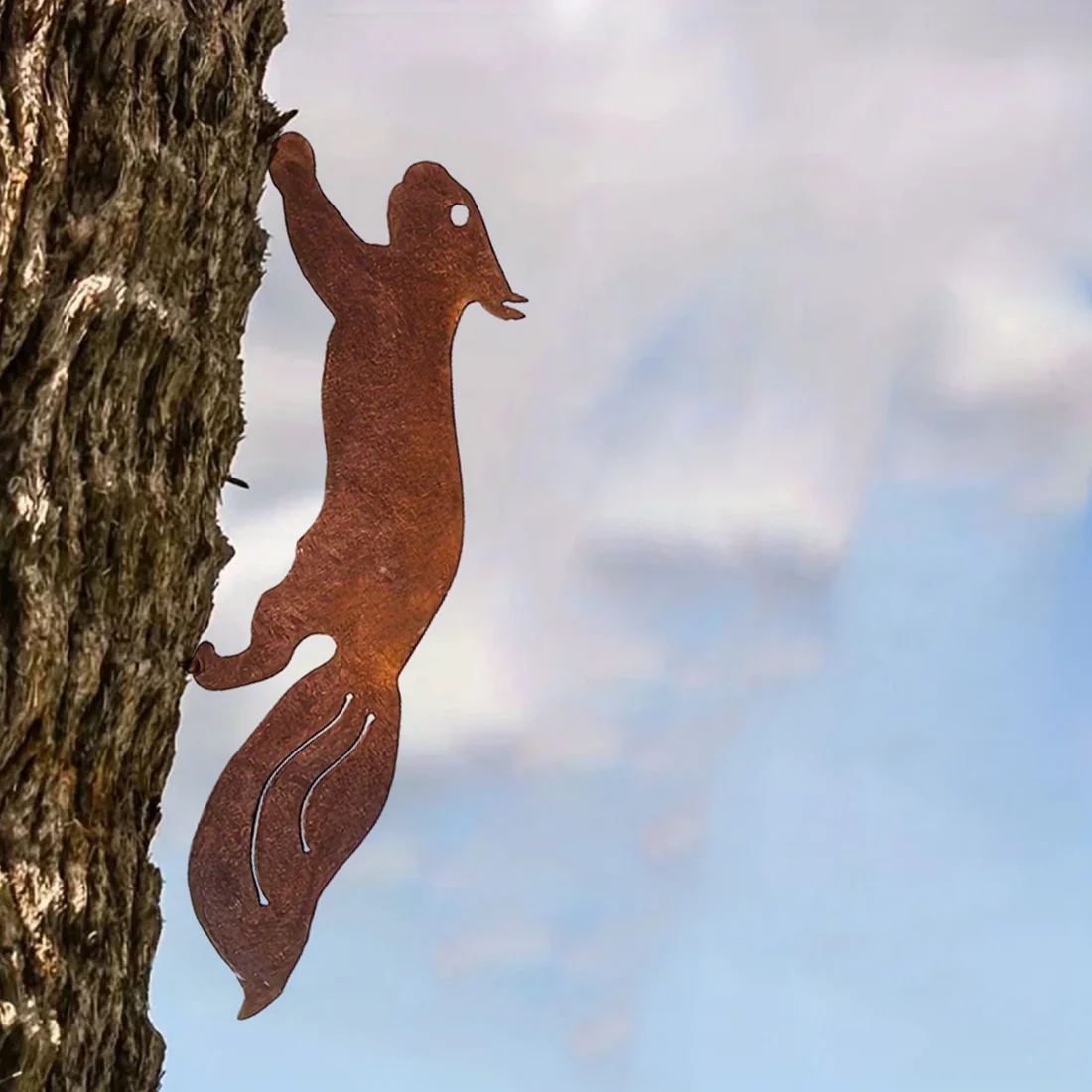 Hypnotize with Rusty Squirrel: A Creative Tree Decor Wonder