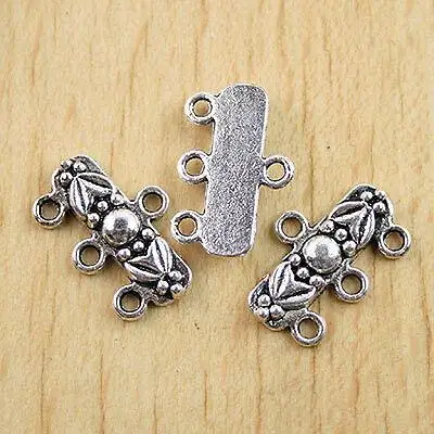 

15pcs 19x12mm.loop:1.2mm Tibetan Silver color flower 1-3 connector Findings h0571