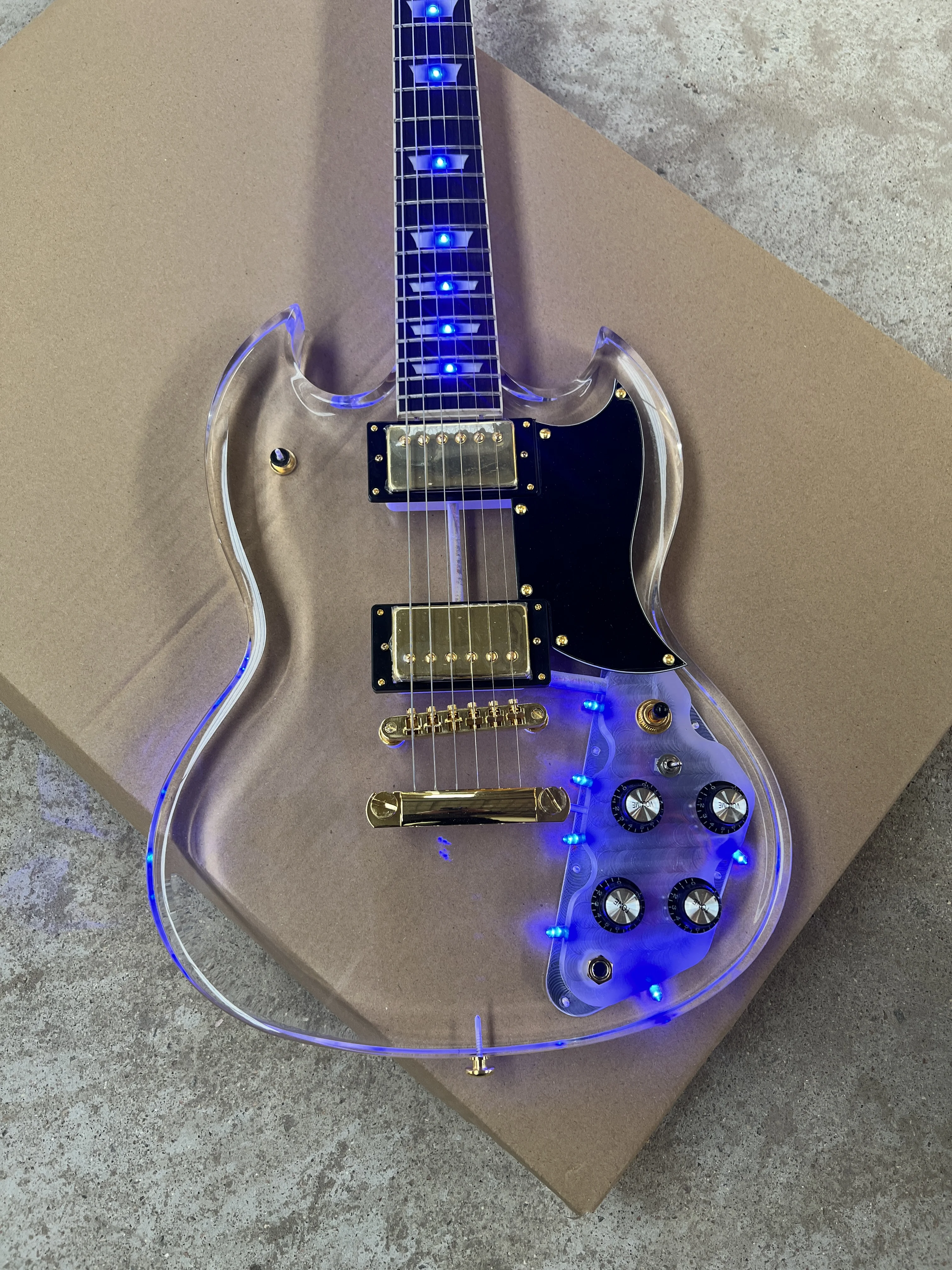 High-quality acrylic Plexiglass clear 6-string electric guitar Blue led lights Gold accessories Free shipping