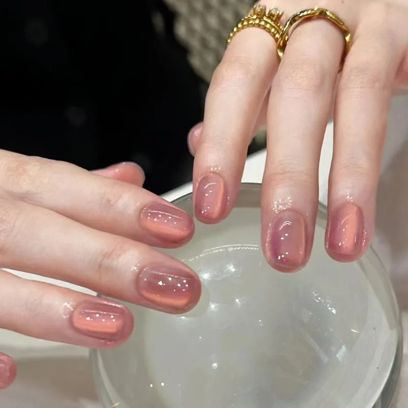 

24 Pcs Sweet Pink Cat Eye Press on Nails with Charms Simple Aesthetic Nail Tips Cheap self-adhesive False Nails for Girls 2025