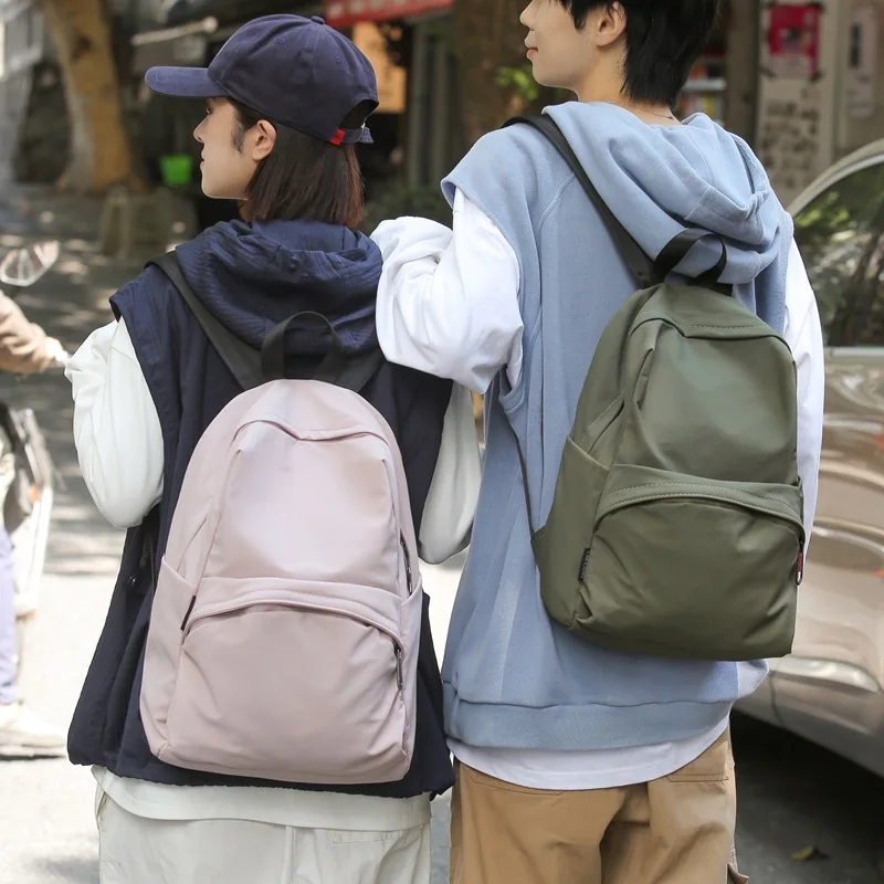 Female 2024 version couple's new large capacity solid color backpack trendy for elementary, middle, and high school