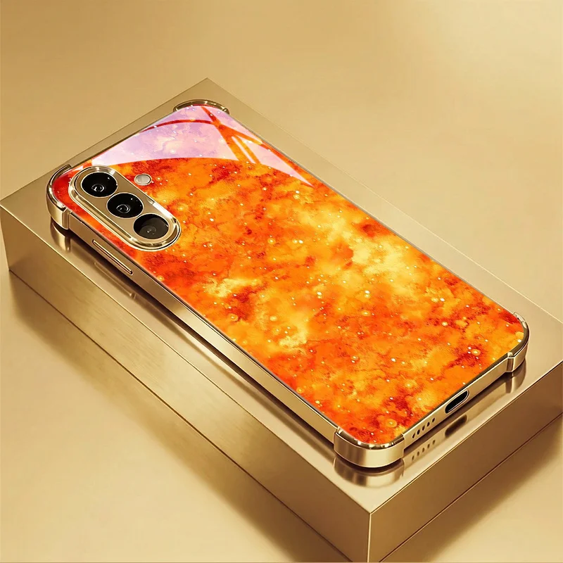 Orange flame pattern corner-resistant electroplated glass phone case,suitable for Samsung S26/S25/S24/S23/S22/S21, etc. models.