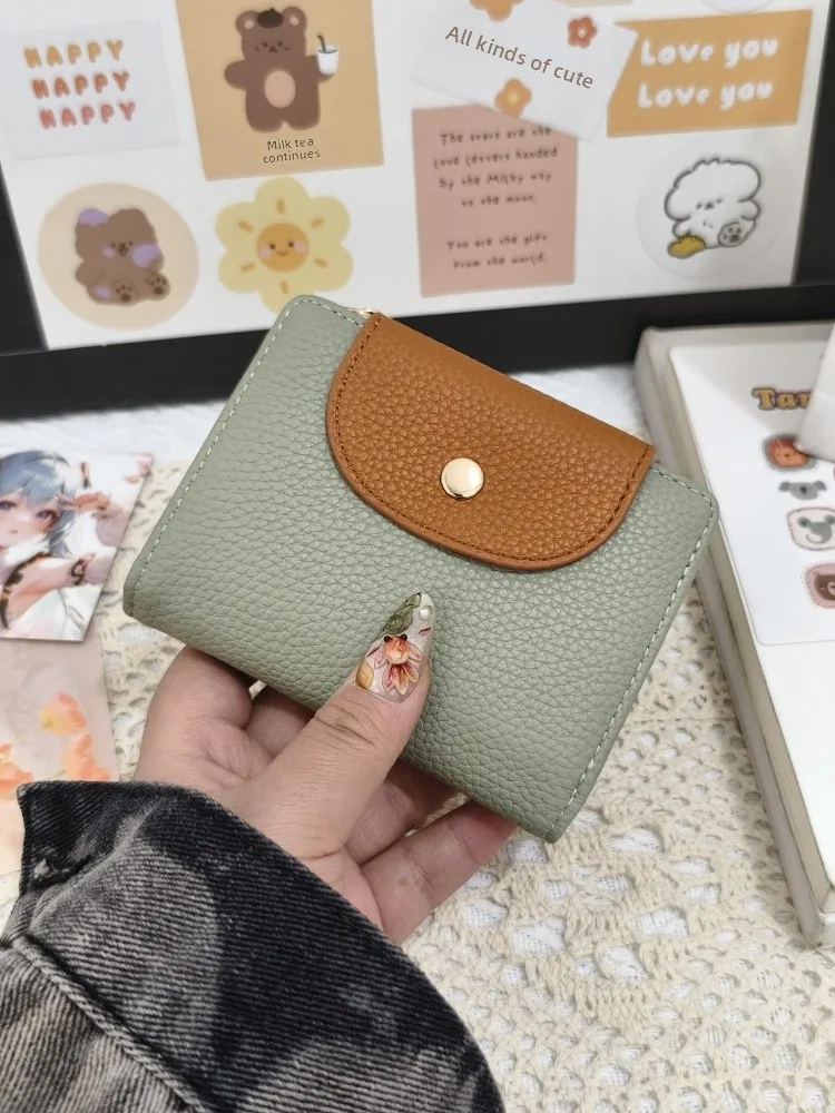 2025 Nuovo semplice portafoglio ort Portamonete con cerniera da donna Posizione multi-carta Due Sta Piccolo fermasoldi Faionable in pelle PU