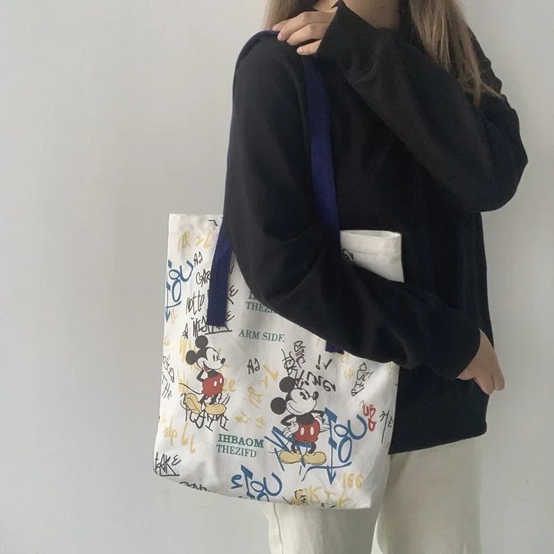 Disney cartoon płócienna torba damska na jedno ramię nowa Mickey Tote studenckie graffiti duża pojemność mała torebka torby Crossbody