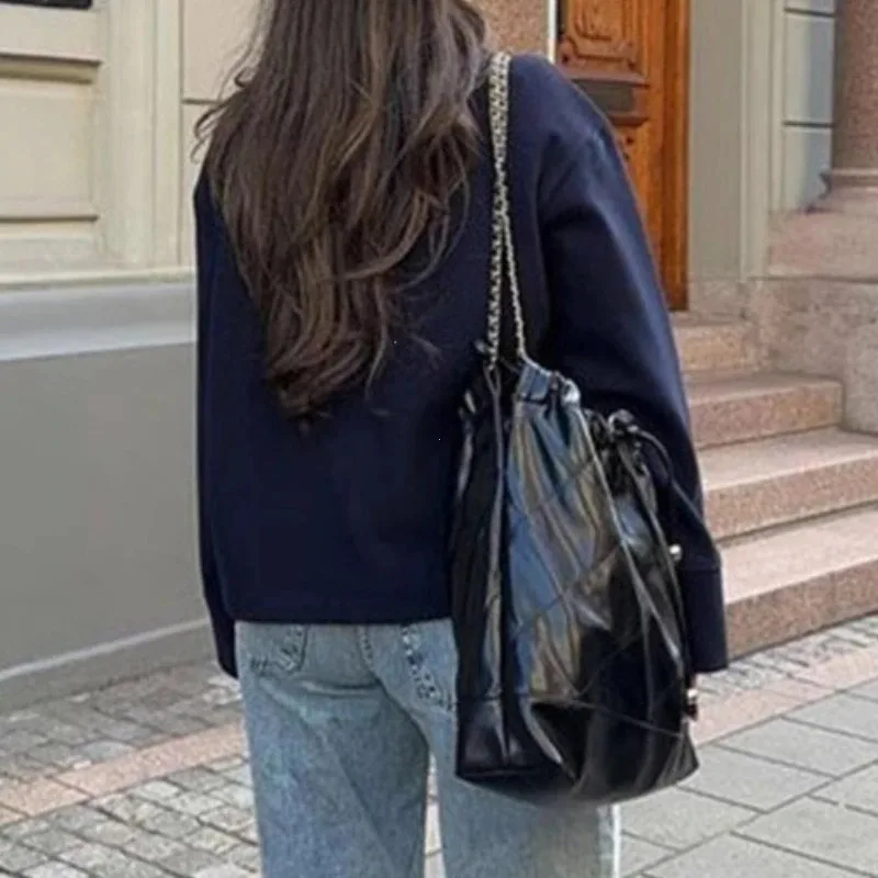 เสื้อโค้ทขนสัตว์ผู้หญิงคอตั้ง แขนยาว ทรงหลวม กระดุมแถวเดียว สไตล์ลำลอง สำหรับฤดูหนาว 2025 และฤดูใบไม้ผลิ เหมาะสำหรับใส่ทำงานหรือเดินเล่น