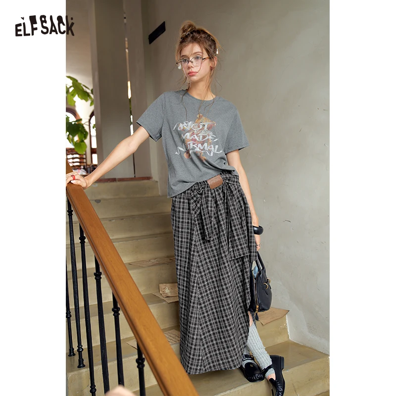 ELFSACK Women's Graphic T-Shirt with Plaid Midi Skirt, Casual 2 Piece Outfit for Everyday, Cozy Asymmetrical Hem Set