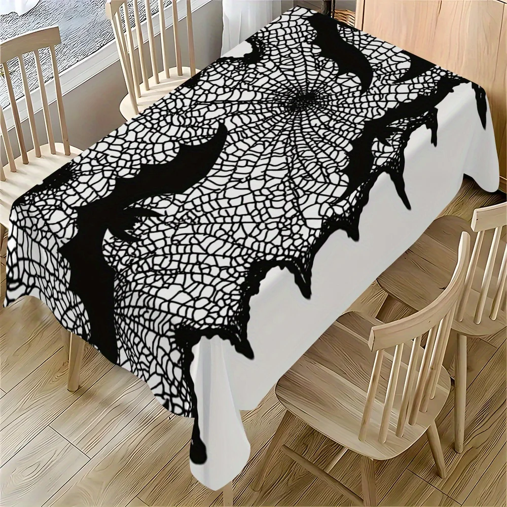 One rectangular tablecloth with Halloween spider web and bat patterns