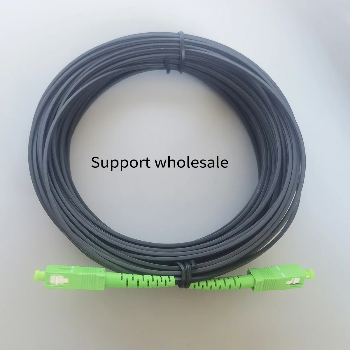 Indoor Drop Cable Fiber Optic Patch Cord SC/APC-SC/APC Single Mode Simplex Optical Fiber Cable With Black Wire 10M-50M Wholesale