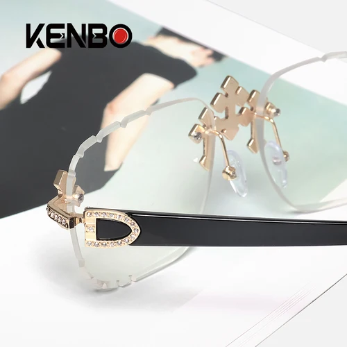 Imagen 2 del producto 2025 gafas de sol cuadradas sin montura a la moda para mujer, montura de Metal con diamantes cruzados, gafas de lujo con lentes cortados UV400, gafas de sol