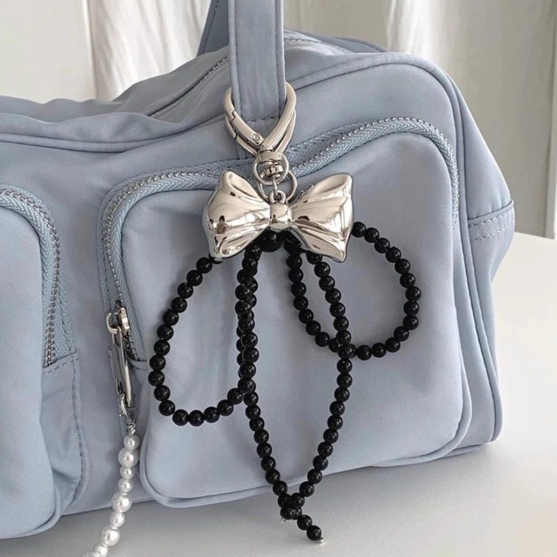 

Ins Style Bowknot Beaded Key Chain Three-dimensional Silver Bow Tie Phone Pendant Headphone Case Charm Car Key Ring Bag Decor