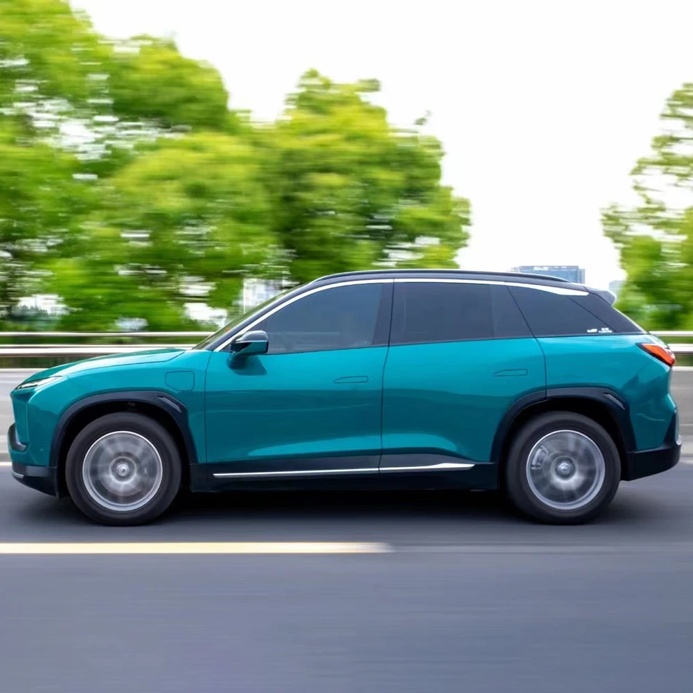 

Windstorm Green Glossy Crystal Vinyl PPF Wrap PET Backing Flat Car Stickers - Durable Protection for Cars