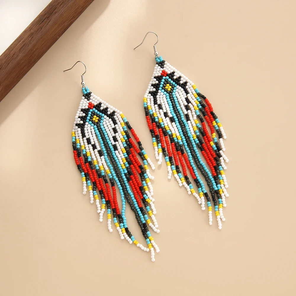 Beaded earrings Tassel Originality Geometry Force table Hand knitting Bohemia Alloy Tide Simple Rice bead earrings