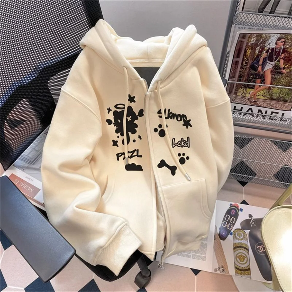 Printemps et automne mince 2025 nouvelle jolie fille fermeture éclair à capuche amusant chat veste Collection tendances de la mode polyvalent décontracté paresseux vent