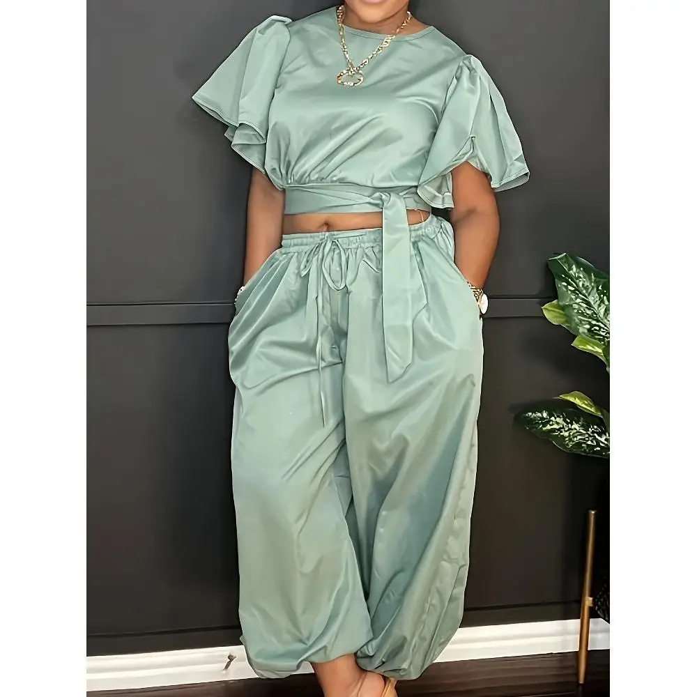 

Повседневный комплект из двух предметов с кружевным топом и брюками с круглым вырезом и рюшами