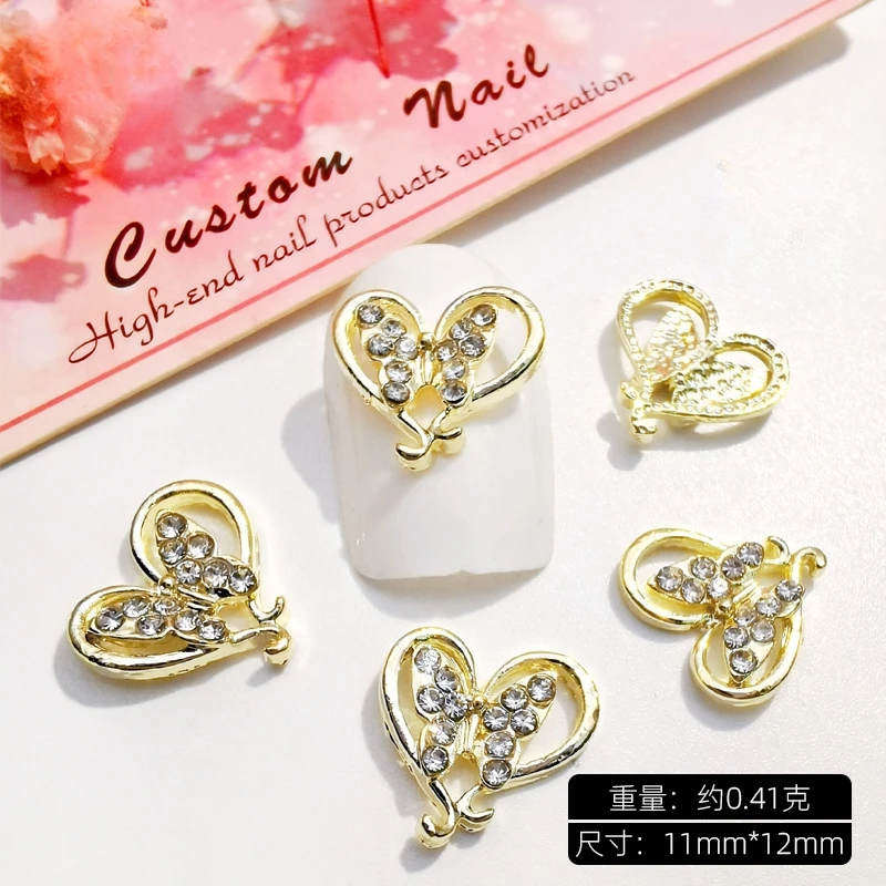 10 Uds. De dijes para uñas de mariposa y corazón hueco 3D, elegantes detalles alados de aleación y diamantes de imitación para manicura romántica