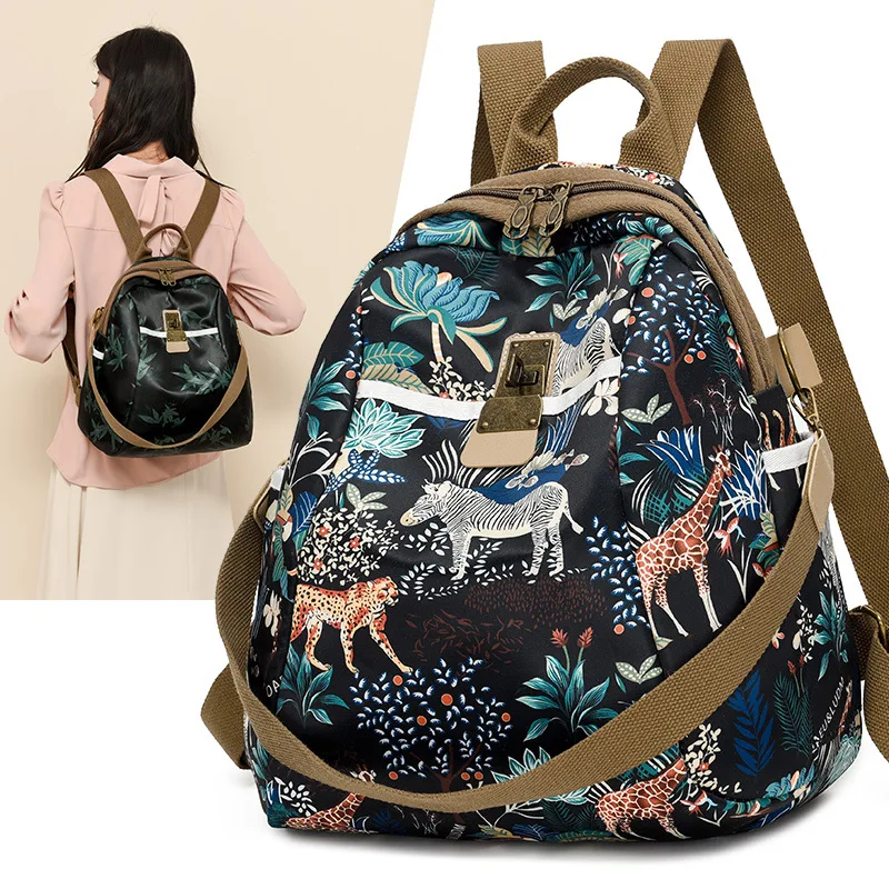 

Retro-style bamboo leaf and flower girls' travel backpack, anti-theft lock, lightweight and waterproof Oxford girls' schoolbag