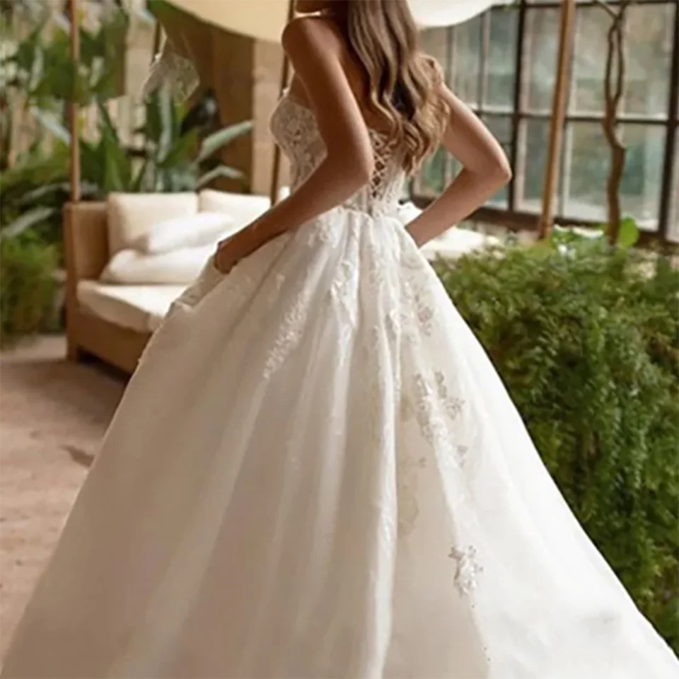 فساتين زفاف رائعة مزينة بالدانتيل على شكل قلب بدون حمالات على شكل حرف A 2025 بأربطة مع ذيل محكمة تول زي العرائس للنساء #4