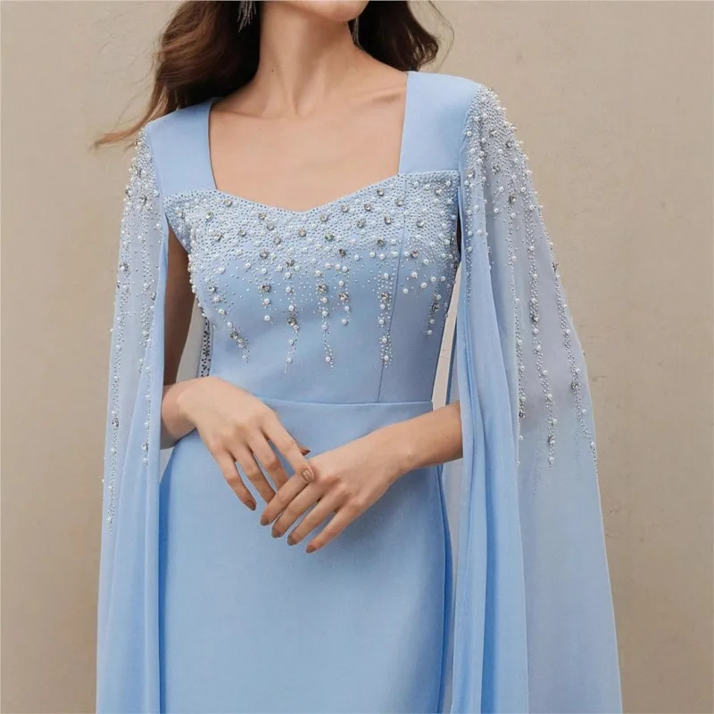 

A classic long dress with light luxury embossed and pearl off-the-shoulder design