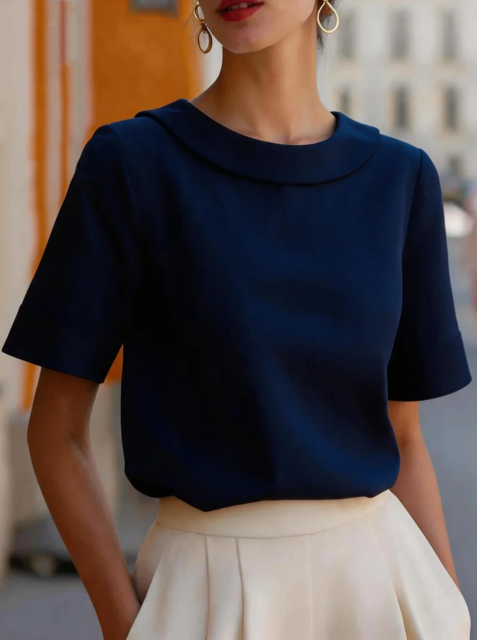 Elegante Kurzarmbluse mit abgerundetem Kragen und strukturierter Passform für Damen im Büro oder für formelle Anlässe. – Detail 6