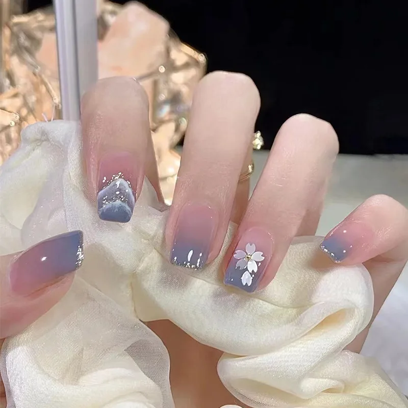 

24Pcs Medium Coffin Press-on Nails: Mountain Blue Ombre with Glitter Fragments & White Florals - Nature Inspired