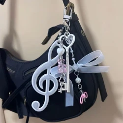 Creative Bowknot Keychain Music Note Pendant Resin Texture Suitable for Music Lovers and Cartoon Enthusiasts Present