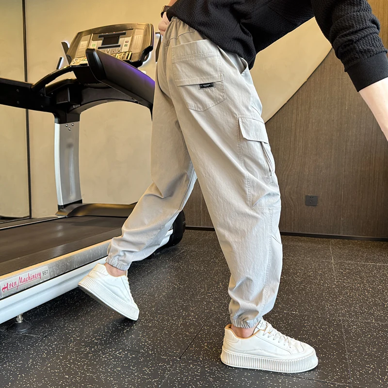 

Мужские повседневные модные спортивные брюки, осенняя новинка, универсальные, свободного кроя, из полиэстера, со средней посадкой, для работы