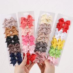 10 pz/lotto bambini nastro di colore solido fiocchi per bambini fermagli per capelli per neonate fatti a mano Bowknot tornante MiNi mollette accessori per capelli