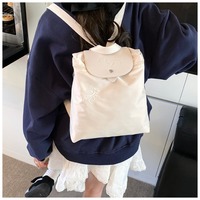Fashion simple shoulder bag foldable 2025 new nylon waterproof backpack college students schoolbag hundred women's bags