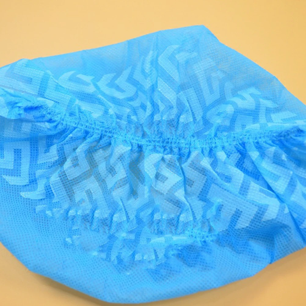 

100 Pcs Shoe Cover Non-slip Covers Heel Protectors for Shoes Men Non-Woven Overshoes