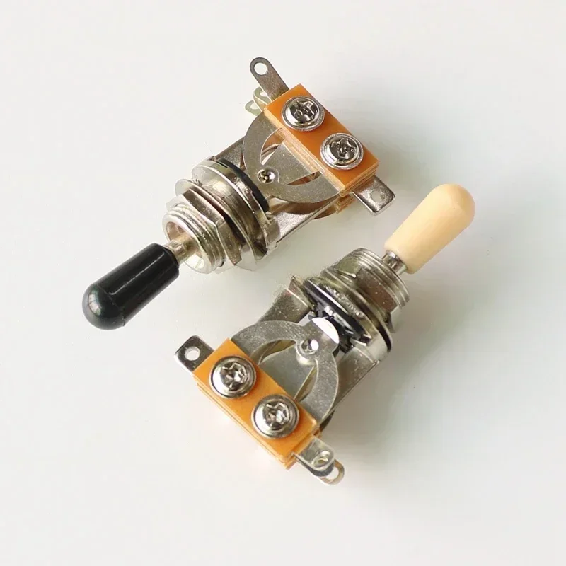 Профессиональный трехпозиционный тумблер — замена наконечника черного и цвета слоновой кости для гитар в стиле Les Paul, SG и TL Профессиональный трехпозиционный тумблер — замена наконечника черного и цвета слоновой кости для гитар в стиле Les Paul, SG и TL