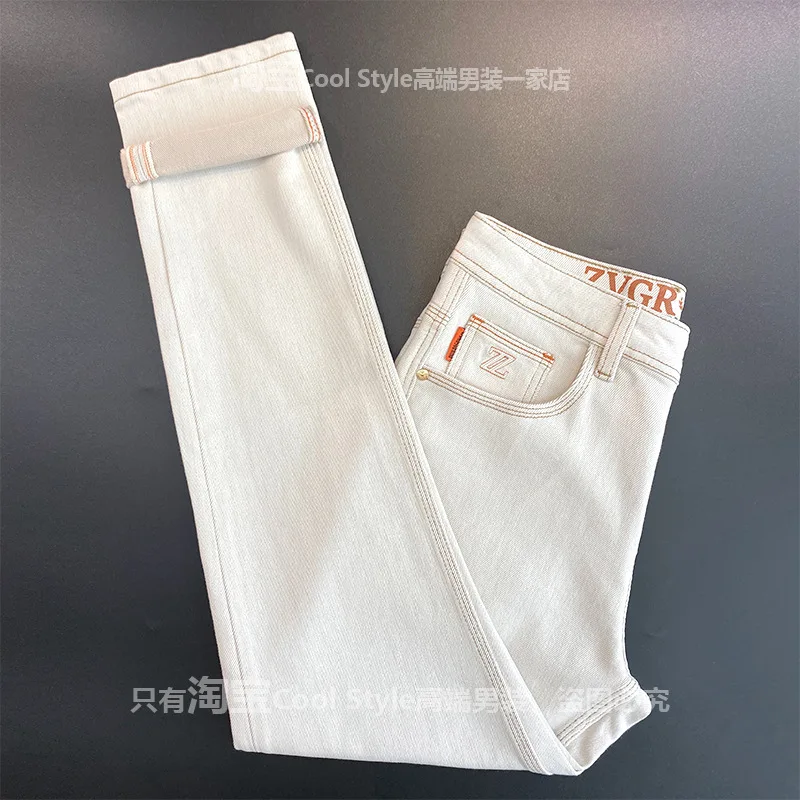 

Высококачественные мужские бежевые джинсы с вышивкой, приталенный крой на маленьких ножках, осенние повседневные брюки на резинке.