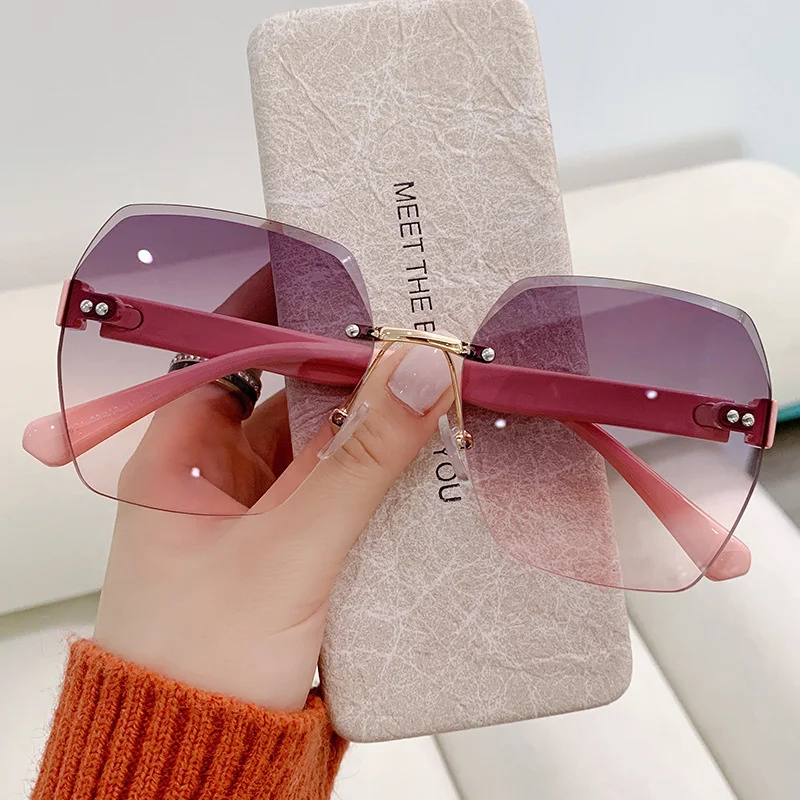 

New frameless sunglasses for women with cut edges, ocean patch, street photo, trendy Korean fashion, large UV resistant