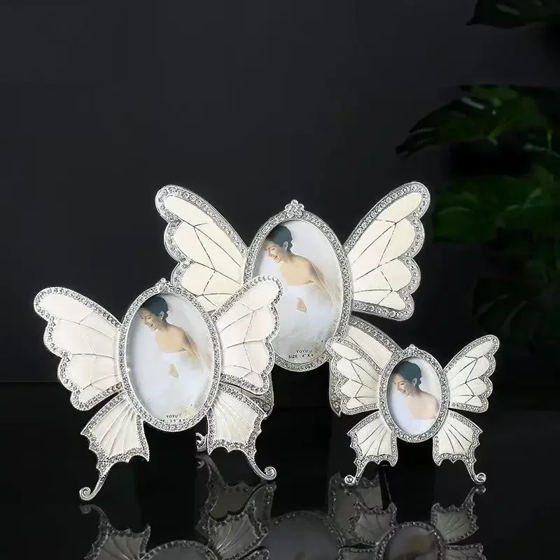 A European style photo frame display table 3/5/6 inch butterfly metal oval photo frame couple children's picture frame decoratio