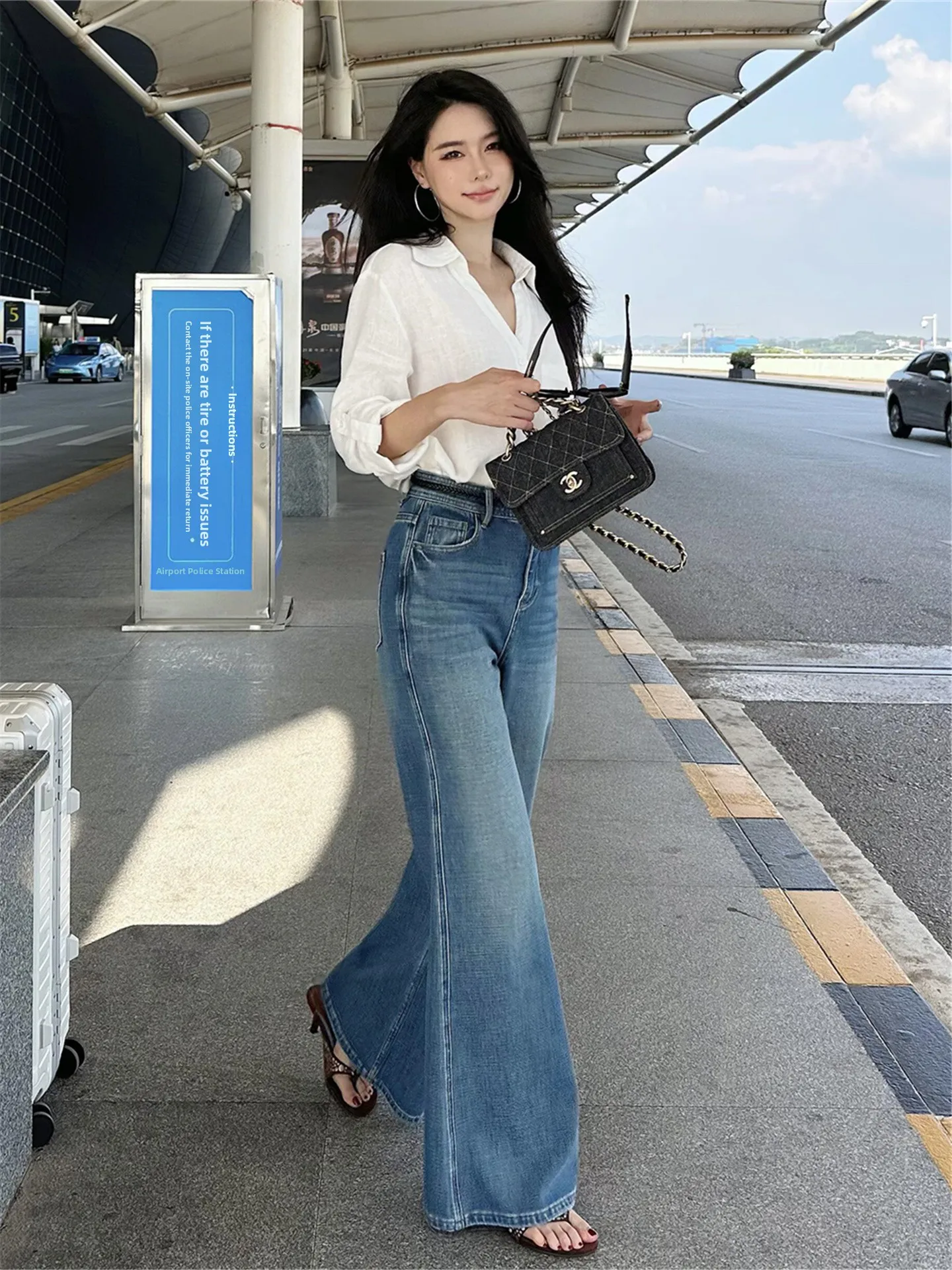 

Американские винтажные джинсы-клеш синего цвета для женщин, свободные, струящиеся, с эффектом драпировки, повседневные, с высокой талией, удлиненные.