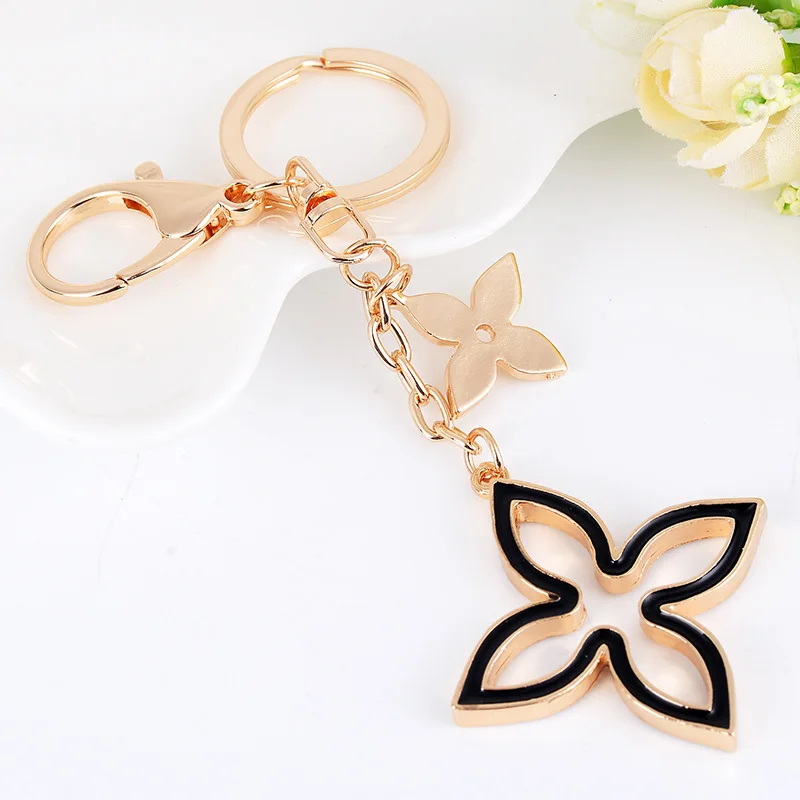 Creative Four Leaf Clover Keychains Car Key Holder Metal Key Chain Ring Fashion Keyrings for Women Bag Charm Pendant Wholesale