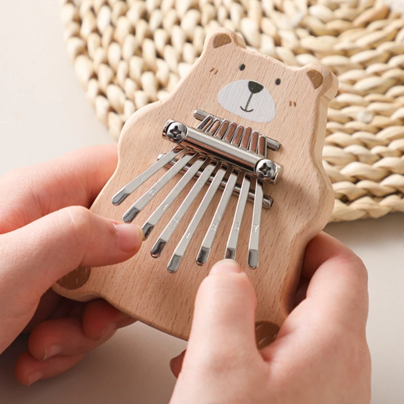 Juguetes Montessori para bebé, Piano de pulgar de oso de dibujos animados, Mini Kalimba de 8 teclas, Piano de dedo exquisito, Marimba portátil, juguete colgante Musical, regalo