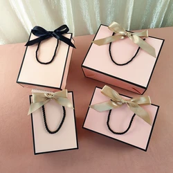 New High Quality Pretty Pink Gift Bag Gift Box Ornament Pajama Book Black Handle With Ribbon Paper Box Bag Kraft Packaging